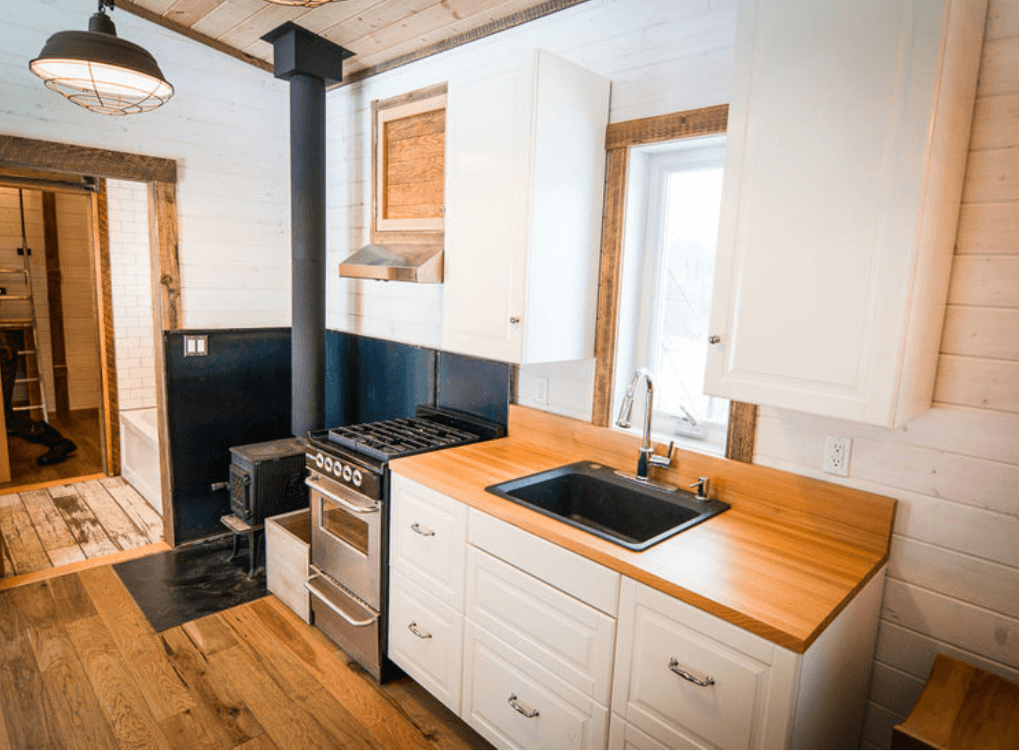 tiny house interior with wood burning stove