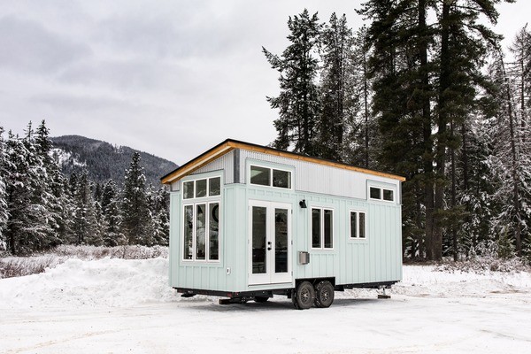 Sherloak Homes Tiny House has Secret Sunroom in 2-Loft Design